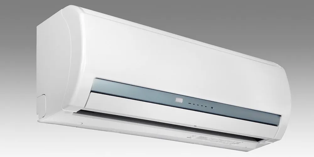 A sleek, modern white split-system air conditioner mounted on a wall. It features a minimalist design with a slim grey display bar in the center.